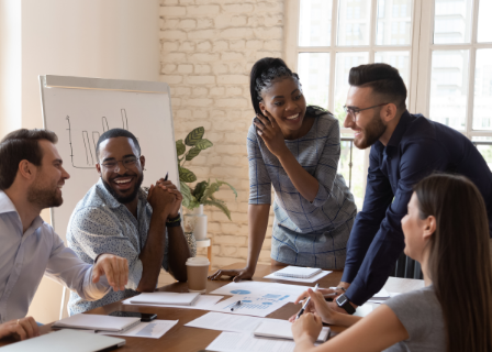 team collaborates at a table