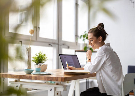 woman working in bright home office