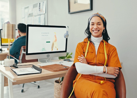 smiling office worker with measuring tape