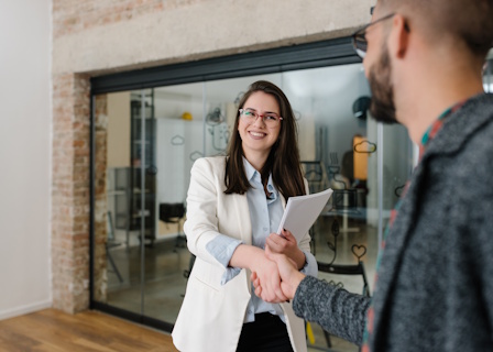 business owner shaking hands