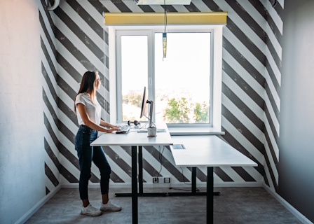 woman working at standing desk