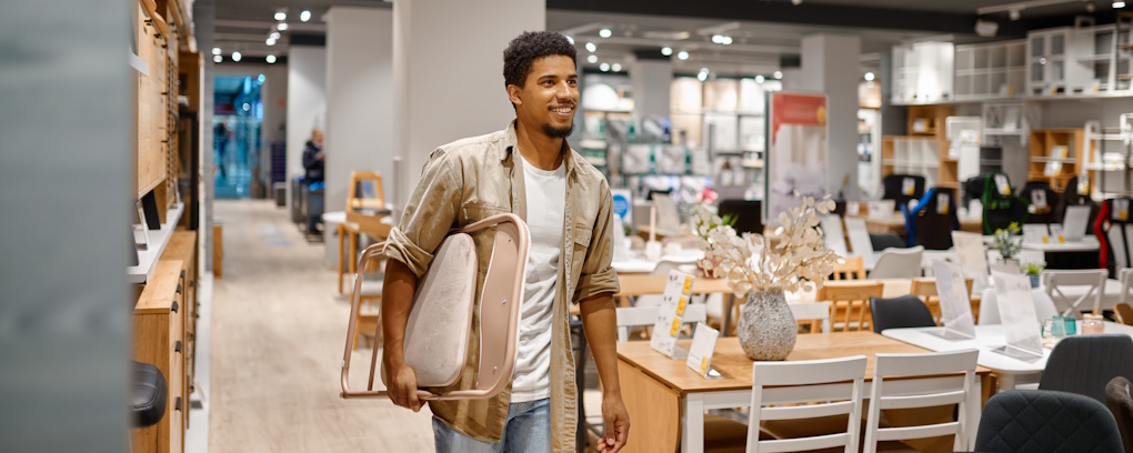 man shopping at used furniture store