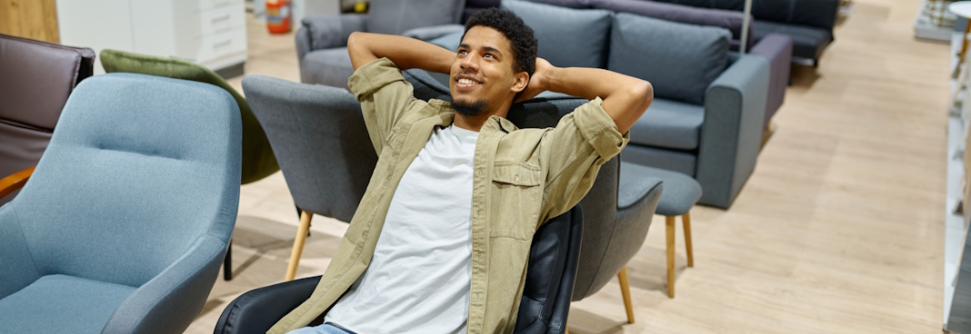 man testing out new office chair
