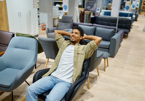 man testing out new office chair